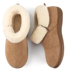 PRICES MAY VARY. Soft faux leather and sherpa lining keep your feet toasty warm, so you can enjoy these with or without socks on. Made of 100% vegan and machine washable materials, they're easy to clean: simply wash in cold on gentle cycle to get rid of dirt, odors, or stains. Thick sherpa cuff and lining reaches above your ankle, with elastic gores that allow easy entry for your foot. The heel loop also helps you easily pull them on or off. Triple-layer footbed featuring memory foam, support fo Shoe Repair Shop, On Clouds, Walking On Clouds, Shoe Repair, Animal Skin, Slipper Boots, Leather Booties, Hiking Boots, Gender Female