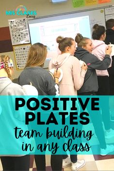 a group of people standing in front of a whiteboard with the words positive plates team building in any class