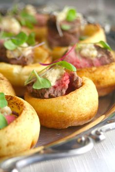 small pastries with meat and vegetables on a plate