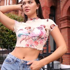 Brand New Without Tags. Cute Sheer Top With Baby Angels And Pink Flowers. Cute Fitted Crop Top For Spring, Cute Stretch Crop Top For Spring, Cute White Fitted Crop Top, Cute Fitted White Crop Top, White Fitted Cute Crop Top, Red Tube Top, Denim Halter Top, Basic Crop Top, Brown Crop Top