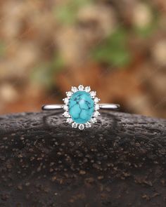 ► FEATURES Engagement Ring: Center Stone: 0.9Ct Turquoise Size:  6x8mm Oval Cut  Side Stone: 0.24 Carat Moissanite(colorless VS, Clarity)   *Band Width (Bottom): 1.6-1.7mm The center stone of the ring can be replaced with other different kinds of gemstone such as morganite, aquamarine, amethyst, citrine, opal, moissanite, alexandrite, moss agate, etc. If you want to customize your own personal ring, please feel free to contact me. ► PROCESSING & SHIPPING Processing time: 3 to 4 weeks after placi Turquoise Ring Engagement, Wedding Rings Halo, Engagement Ring White Gold, Vintage Western, December Birthstone, Wedding Rings For Women, Elegant Gift, Promise Rings, Ring Verlobung