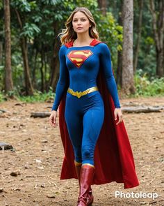 a woman in a superman costume walking through the woods