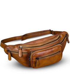 a brown leather fanny bag with two zippers