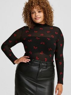 FIT Model is 5'10. 5” wearing size 1. . Measures 30” from shoulder. . MATERIALS + CARE Mesh knit fabric. 95% nylon, 5% spandex. Machine wash cold. Tumble dry low. . Imported. . DETAILS Mock neckline. Long sleeves. . The best plus size women's mesh mock neck long sleeve top tops in outline toss bows deep black made of mesh. Torrid is your destination for cozy fall and winter clothes to keep you warm and comfortable. Black Mesh Top Outfit, Mesh Top Outfit, Plus Size Long Sleeve Tops, Black Mesh Top, Mock Neck Long Sleeve, Corset Crop Top, Mock Neckline, Knit Fashion, Cute Casual Outfits