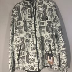 The North Face Hoddie Is Beautiful. Picture Of The Care Label Included ( This Fabric Is Fully Waterproof, Wind Proof And Breathable The North Face Windbreaker With Pockets For Fall, The North Face Fall Windbreaker With Pockets, Long Sleeve Windbreaker With Graphic Print For Outdoor, The North Face Urban Hooded Outerwear, The North Face Fall Streetwear Hooded Jacket, Urban Hooded Outerwear By The North Face, Urban Outerwear With Pockets By The North Face, Sporty Hooded Outerwear With Graphic Print, The North Face Winter Windbreaker With Pockets