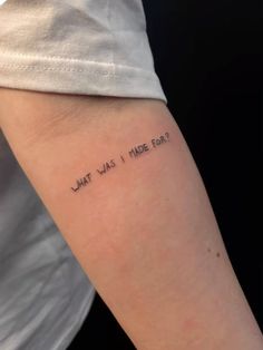 a woman's arm with the words what was i miss you written on it