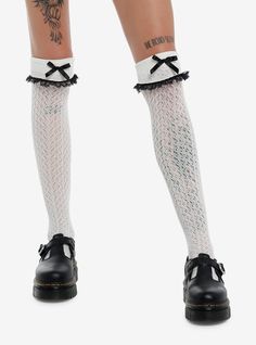 Spice up your look with these white  crochet over-the-knee socks! The come with cuff detailing at the top and dainty  black satin bow accents.NylonHand wash cold; drip dryImported White Knee-high Stockings For Spring, White Knee-high Stockings For Fall, White Stockings For Fall, Gyaru Socks, Garter Socks, Y2k Socks, Lace Trim Socks, Black White Crochet, Frill Socks