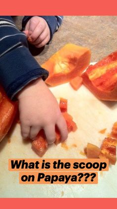 a child is cutting up some food on a cutting board