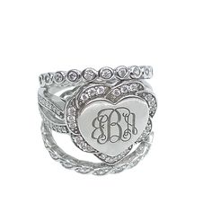 Discover Elegance with Our Sterling Silver Monogram Ring Uniquely Yours, Expertly CraftedExperience the perfect blend of luxury and personalization with our Engraved Stacking Monogram Ring. This exquisite piece is meticulously handcrafted from the finest 925 sterling silver, ensuring a lasting shine. Its high-polished finish is beautifully complemented by the brilliance of nestled cubic zirconia, adding a touch of sparkle to your everyday look. Personalize ItMake it uniquely yours! This ring all Heart-shaped Diamond Stackable Jewelry, Heart Shaped Diamond Stackable Jewelry, Heart Shaped Stackable Diamond Jewelry, Heart Shaped Monogram Jewelry For Anniversary, Anniversary Monogram Jewelry In Cubic Zirconia, Wedding Jewelry With Initials In Cubic Zirconia, Personalized Adjustable Heart Cut Jewelry, Stackable Silver Jewelry For Valentine's Day, Silver Stackable Heart Ring For Wedding