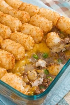 a casserole dish with tater tots and meat