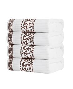 four towels stacked on top of each other in brown and white designs, with one folded up