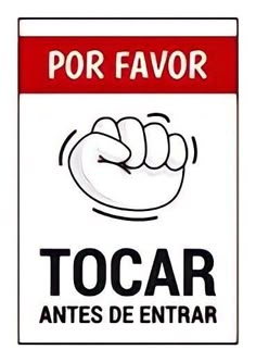 a red and white sign that says tocar antes de entrar por favor