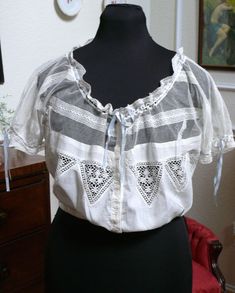 Victorian Fitted Tops For Summer, Fitted Victorian Tops For Summer, Fitted Victorian Summer Tops, Vintage Camisole Top For Daywear, Fitted Camisole Blouse For Daywear, Cotton Camisole Blouse For Daywear, Victorian Cotton Tops For Summer, Victorian Cotton Top With Lace Trim, Victorian Cotton Tops With Lace Trim