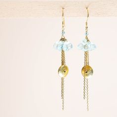 Inspired by ballerinas, all of the earrings in this collection are gracefully designed to "dance" with the light. - Aquamarine briolette gemstones- 3" long - French hooks- 14k gold plated .925 fine Italian sterling silver- Made in the USA in our NYC studio- Packaged in a gift box- Free shipping on US orders Handmade to last. Our unique gold plating technique makes our jewelry tarnish resistant. The nature of natural gemstones makes each style one-of-a-kind. Handmade Elegant Dangle Threader Earrings, Adjustable Gold-plated Earrings For Parties, Adjustable Gold Plated Earrings For Party, Adjustable Yellow Gold Earrings For Party, Gold Drop Chandelier Earrings With Ear Wire, Gold-plated Drop Earrings With French Hook, Gold Plated Drop Earrings With French Hook, Gold Sterling Silver Earrings For Celebration, Gold Plated French Hook Drop Earrings