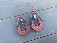 "This listing is for a pair of gorgeous nativity wood earrings! These beautiful, lightweight, wood earrings are the perfect addition to any holiday outfit! Buy these for yourself or as a gift for your sister, mom, friend, or co-worker! Earrings measure 1.5\" and are made of wood. Be sure to check out the rest of our O Holy Night collection! If you don't see the color or style you need, contact us for a custom order! Spend $35 or more and receive FREE shipping in the US! Please note - I strive to Macrame Wooden Star Earrings, Nativity Earrings Clay, Wood Nativity Earrings, Wood Christmas Earrings, Wooden Christmas Earrings, Nativity Wood, Diy Laser Engraver, Wood Jewelry Diy, Glowforge Projects