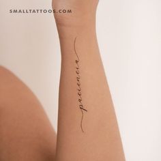 a woman's arm with a tattoo that reads, love is in the air