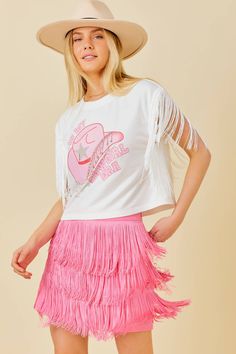 Rhinestone Embellished Cowgirl Graphic Tee With Fringed Shoulder Detail "For a look that's both glitzy and gritty, this tee has got you covered. With rhinestone embellishments and a fringe shoulder detail, you'll be sure to stand out in any crowd. Yeehaw!" Sparkle Fringe Shirt, White Fitted Fringe Tops, Fringe Graphic Tee, Trendy Short Sleeve T-shirt With Fringe, Casual Cotton T-shirt With Fringe, Cowgirl Graphic, Cowgirl Era, Scarf Coverup, Rebecca Black