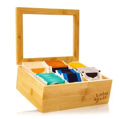 a wooden box filled with lots of different colored papers in it's lid and inside