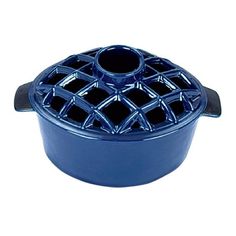 a blue casserole dish with latticed design on the front and bottom, set against a white background