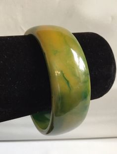 Vintage Bakelite Wide Bangle Bracelet Green Yellow Marbled 2 1/2” Across Inside | eBay Green Bangle For Collectible Jewelry, Green Bangle Jewelry Collectible, Green Bangle Collectible Jewelry, Vintage Green Bangle Jewelry, Elegant Bakelite Bangle As Gift, Vintage Adjustable Green Bangle, Vintage Bakelite Bangle, Bakelite Bangles, Bakelite Jewelry