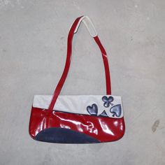 Incredible rare Miu Miu bag from AW1999. Good vintage condition. Considerable marking to the patent body of the bag but due to it being black on red, it doesn't stand out too much. Please inspect photographs carefully. Small bleached spot on the mesh, as pictured.  MEASUREMENTS:  Width: approx. 30cm Height: approx. 16cm Handle Drop: approx. 28.5cm Vintage Red Shoulder Bag With Detachable Strap, Miu Miu Shoulder Bag With Removable Pouch, Retro Red Shoulder Bag With Zipper Closure, Miu Miu Archive Bag, Modern Red Shoulder Bag With Silver-tone Hardware, Miu Miu Bag, Miu Miu, Too Much, Shoulder Bags