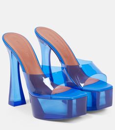 Dalida Glass PVC Platform Mules in Blue - Amina Muaddi | Mytheresa Luxury Blue Mules, Blue Leather Platform Mules, Modern Mules With Reinforced Heel For Party, Designer High Heel Platform Mules, Luxury Platform Mules For Party, Chic Platform Slippers With Padded Heel For Party, Evening Blue Mules With Padded Heel, Blue Evening Mules With Padded Heel, Leather Open Heel Platform Slippers For Party