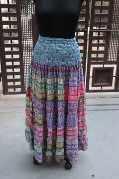 "Flared and flowy, very easy to wear This long patchwork skirt has an elasticated waist for comfort and can easily be pulled on over the head or up from the ankles as desired. Always one of a kind patchwork boho style long floaty skirt for festivals and parties it has elasticated waist band, and will fit most of sizes ...MEASURE... Length 40\" Waist-36\"-40\" FABRIC- Polyester" Long Tiered Skirt, Silky Skirt, Festival Skirts, Patchwork Skirt, Skirt Long, Party Festival, Summer Skirts, Boho Hippie, Waist Band