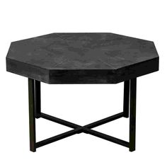 an octagonal table with black metal legs and a hexagonal design on the top