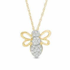 With sparkle and whimsy, this diamond bee pendant will dazzle and delight. Crafted in warm 10K gold, this charming style features a diamond-lined body and polished wing outlines. Radiant with 1/10 ct. t.w. of diamonds and a brilliant buffed luster, this design suspends along an 18.0-inch rope chain that secures with a spring-ring clasp. Bee Jewelry, Bee Pendant, Round Moissanite, Diamond Stone, 10k Gold, Necklace Designs, Spring Rings, Gold Finish, Colored Diamonds