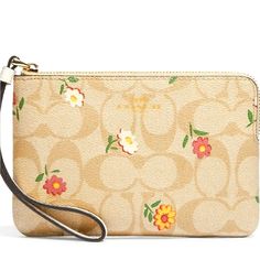 Add A Touch Of Elegance To Your Wallet Collection With This Coach Corner Zip Wristlet. Featuring A Beautiful Floral Pattern And Made Of High-Quality Coach Signature Canvas, This Wristlet Is Perfect For Any Occasion. The Gold/Light Khaki Multi Color Combination And Nostalgic Ditsy Print Theme Make It A Stylish Accessory That Will Complement Any Outfit. Measuring 6 1/4" (L) X 4" (H) X 1/2" (W), This Wallet Has Ample Space For Credit Cards And A Checkbook. The Wristlet Comes With A Strap And Zipper Beige Rectangular Wristlet For Spring, Rectangular Beige Wristlet For Spring, Coach Pouch Wallet For Spring, Coach Spring Pouch Wallet, Beige Wallets For Spring, Blue Coach, Coach Clutch, Wrist Wallet, Ditsy Print