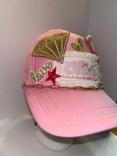 Beer and Cowboys themed Trucker Patch Hat. (holding pins removed upon heat transfer)  These are the hottest trend on social media today. Great for festivals, concerts, night life and everyday wear. This foam trucker hat is fully adjustable and offered in hat colors Black, White, Light Pink, Neon Pink, Neon Yellow and Green Camouflage. Custom Hats avail. One size fits all. $35 Small Print: patch, mama, cowboy, hat, faith, rock and Roll, trucker, patch, cap, chain, iron on, sew on, festival, conce Trendy Pink Hats For Music Festival, Fun Pink Hat For Music Festival, Festival Trucker Hat Snapback, One Size, Festival Snapback Trucker Hat, One Size Fits Most Snapback Trucker Hat For Festivals, Cute Festival Trucker Hat, Festival Trucker Snapback Baseball Cap, Festival Trucker Snapback Hat, Trucker Snapback Hat For Festivals