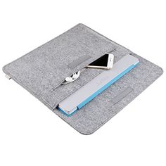 an ipad case with a pen and tablet on it