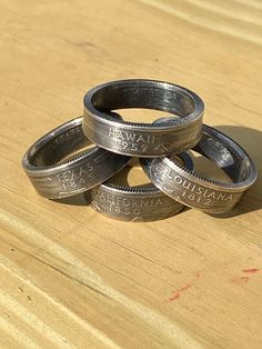 Handmade state and territory quarter rings made from genuine US quarter silver proofs. Rings are available in a variety of sizes. Nickel-free Southwestern Silver Rings, Quarter Ring, State Quarters, Handmade Silver, Rings Statement, Statement Rings, Ring Size, Jewelry Rings, Gift Card