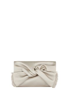 "Find ANYA HINDMARCH Bow Clutch Bag In Double Satin on Editorialist. Anya Hindmarch clutch bag in sleek double-face satin, knotted into a bow with fringe Flap top with magnetic closure Interior card pocket Lining: Suede Approx. 5.9\"H x 8.2\"W x 1.9\"D Imported" Fringe Clutch, Bow Clutch, Suede Clutch, Straw Clutch, Pocket Cards, Anya Hindmarch, Leather Clutch Bags, Double Face, Metallic Leather