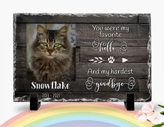 a wooden sign with a cat on it