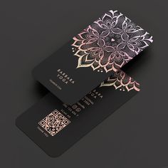 two black and pink business cards with gold foil designs on the front one has a qr code