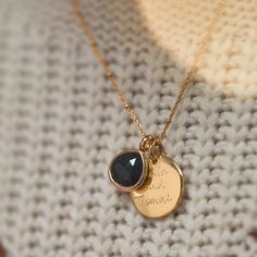 Symbolising strength and support, our semi-precious black onyx gemstone is paired with our signature disc charm, and hand-engraved to create a personalized necklace as unique as you are.Please note that there may be slight variations between each birthstone and gemstone due to its origins.18K Champagne Gold Plated, 925 Sterling Silver or 18K Rose Gold PlatedDisc Charm: 0.7 x 0.7Gemstone: 0.5 x 0.5Secure clasp fasteningCharms are removable from this chain and can be worn on all Merci Maman chain Affordable Personalized Black Jewelry, Affordable Personalized Black Charm Necklaces, Cheap Personalized Black Charm Necklaces, Personalised Necklace, Gold Charm Necklace, Onyx Gemstone, Champagne Gold, Personalized Necklace, Gold Charm