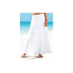 Flowy maxi skirt made from soft, draping fabric with tiers and over stitched seams. * Elasticated waistband * Slightly lower rise * Soft stretch fabric * Runs large * Length approx. 35.5 inches * Viscose/elastane. Imported. * Machine wash cold with like colors, inside out * Hang to dry or lay flat Beach Maxi Skirt With Gathered Detail, Beach-style Gathered Maxi Skirt, Beach Tiered Maxi Skirt With Ruffled Details, Beach Tiered Maxi Skirt, Beach Tiered Ruffled Maxi Skirt, Relaxed Long Skirt With Layered Hem, Voluminous Beach Skirt, Beach Maxi Length Gathered Skirt, Gathered Maxi Skirt For Beach