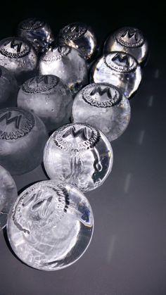 some glass buttons are sitting on a table