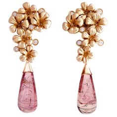 Plum Blossom contemporary cocktail clip-on earrings are in 18 karat rose gold. They are encrusted with 10 round diamonds and removable drops of natural pink tourmalines (about 16.4 carats), which can be taken off. This jewellery collection was featured in Vogue UA, designed by the oil painter from Berlin, Polya Medvedeva. The length of each earring is 5 cm. We use top natural diamonds VS, F-G, we work with german gems company, that in the market since 19th century. The earrings fit best to class Designer Earrings Studs, Sparkling Jewelry, White Diamond Earrings, Cocktail Earrings, Contemporary Earrings, Natural Jewelry, Gold Cocktail, Earrings Studs, Plum Blossom