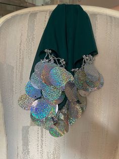 Scarf decorated with beads and sequins. Perfect for wedding guests and family Festive Embellished Sequin Fabric For Parties, Green Sequin Fabric For Festive Party, Traditional Sequin Fabric With Mirror Work For Party, Embellished Sequin Fabric For Festivals And Celebrations, Embellished Sequin Fabric For Celebration And Festivals, Traditional Party Sequin Fabric With Mirror Work, Green Sequin Fabric For Party And Festive Occasions, Festival Party Sequin Fabric With Mirror Work, Traditional Embellished Sequin Fabric For Party