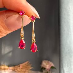 A pair of exquisite Art Deco style gold ruby earrings with 2 genuine Ruby stones on each. A perfect gift for a special occasion, such as birthdays, anniversaries or simply a treat to yourself. The earrings are crafted in 14k gold vermeil  (Sterling silver base and thick 14K gold on top), ensuring it to keep its lustre for longer. Available in 14K white gold vermeil and yellow gold vermeil. The perfect Mother's Day gift or birthday gift for her!  Also available in Emerald earrings: https://www.et Ruby Yellow Gold Earrings For Gift, Ruby Earrings In Yellow Gold For Gift, Yellow Gold Ruby Earrings For Gift, Red Drop Earrings For Gift, Rose Gold Ruby Earrings For Gifts, Mother's Day Gift Earrings With Cubic Zirconia, Ruby Gemstone Earrings As Gift, Elegant Gemstone Earrings With Lab-created Ruby, Lab-created Ruby Gemstone Earrings As Gift