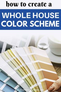 a person holding a color swatch with the words how to create a whole house color scheme