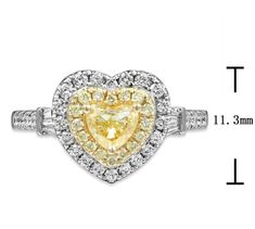 Elevate your style with our stunning canary fancy vivid yellow heart shape cut halo ring. With a brilliant 0.96ct total weight, this ring boasts a striking heart-shaped cut that will catch the eye of all who see it. Add a touch of elegance to any outfit with this beautiful statement piece. Metal: 18K Two GoldCenter Diamond: Heart Shape Cut (1) - 0.51carat Vivid Yellow CanaryPave Diamonds: 28 Round Cuts- 0.33ct t.w. / 16 Fancy Yellow Round Cuts 0.12ct tw Dimensions: W 11.3mm Sizable for desired ring size please leave us a note at the check out. Heart Shape Diamond Ring, Heart Shaped Diamond Engagement Ring, Shaped Engagement Rings, Necklace Guide, Heart Shaped Diamond Ring, Heart Shaped Engagement Rings, Pear Shaped Diamond Ring, Fancy Light, Diamond Initial Necklace