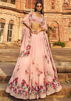 Blush pink organza lehenga set with colorful thread embroidery and embellished with pearls. Silk Lehenga In Pink With Traditional Drape, Festive Hand Embellished Pink Dresses, Pink Silk Lehenga With Traditional Drape, Pink Silk Anarkali Set For Wedding, Pink Hand Embellished Anarkali Set For Wedding, Hand Embellished Pink Anarkali Set For Wedding, Elegant Pink Hand Embellished Traditional Wear, Elegant Hand Embellished Pink Traditional Wear, Pink Organza Sets With Traditional Drape