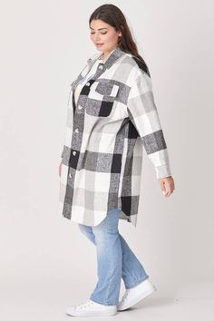 Introducing our Plus Size Plaid Shacket! This black and white plaid shacket is both chic and comfortable, making it the perfect layering jacket. With pockets, it's the ultimate practical and stylish choice for any event, whether you dress it up or keep it casual. Plaid Shacket Plus Size, Long Shacket, Jacket Making, Poncho Jacket, Plaid Shacket, Model Fits, Shorts With Tights, Cooler Weather, Knitwear Cardigan