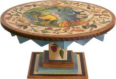 a wooden table with an artistic design on it