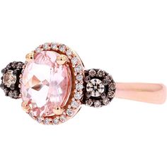 Dive into a world of unmatched luxury with the 14K Rose Gold Oval MoRose Goldanite Ring. Delicately crafted, this ring is a testament to elegance and sophistication. At its heart lies a captivating moRose Goldanite, exuding a soft, rosy hue that symbolizes love and compassion. Encircling the moRose Goldanite are dazzling diamonds, totaling 0.38 Carats, adding a touch of brilliance and sparkle to the piece.Crafted in 14K rose gold, this ring boasts warmth and femininity, complementing the soft tones of the moRose Goldanite perfectly. Whether worn as a statement piece or as a symbol of an eternal bond, this ring is sure to captivate hearts and turn heads wherever you go. Embrace the beauty of nature with this exquisite ring, a true reflection of your unique style and grace.Indulge in luxury, Luxury Oval Rose Gold Diamond Ring, Luxury Pink Oval Halo Ring, Luxury Pink Oval Cluster Ring, Luxury Oval Cluster Ring In Rose Gold, Exquisite Oval Rose Gold Ring, Luxury Oval Halo Ring In Rose Gold, Luxury Oval Rose Gold Halo Ring, Oval Rose Gold Rings With Diamond Accents, Oval Rose Gold Ring With Halo