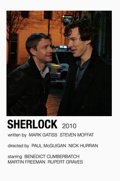 two men standing next to each other in front of a building with the words sherlock written on it