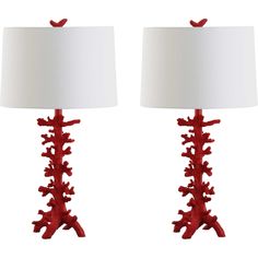 two red coral lamps with white shades on each lamp and one light is turned off